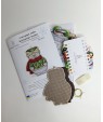 Cross-stitch kit “Snowman snake” — green hat and red scarf